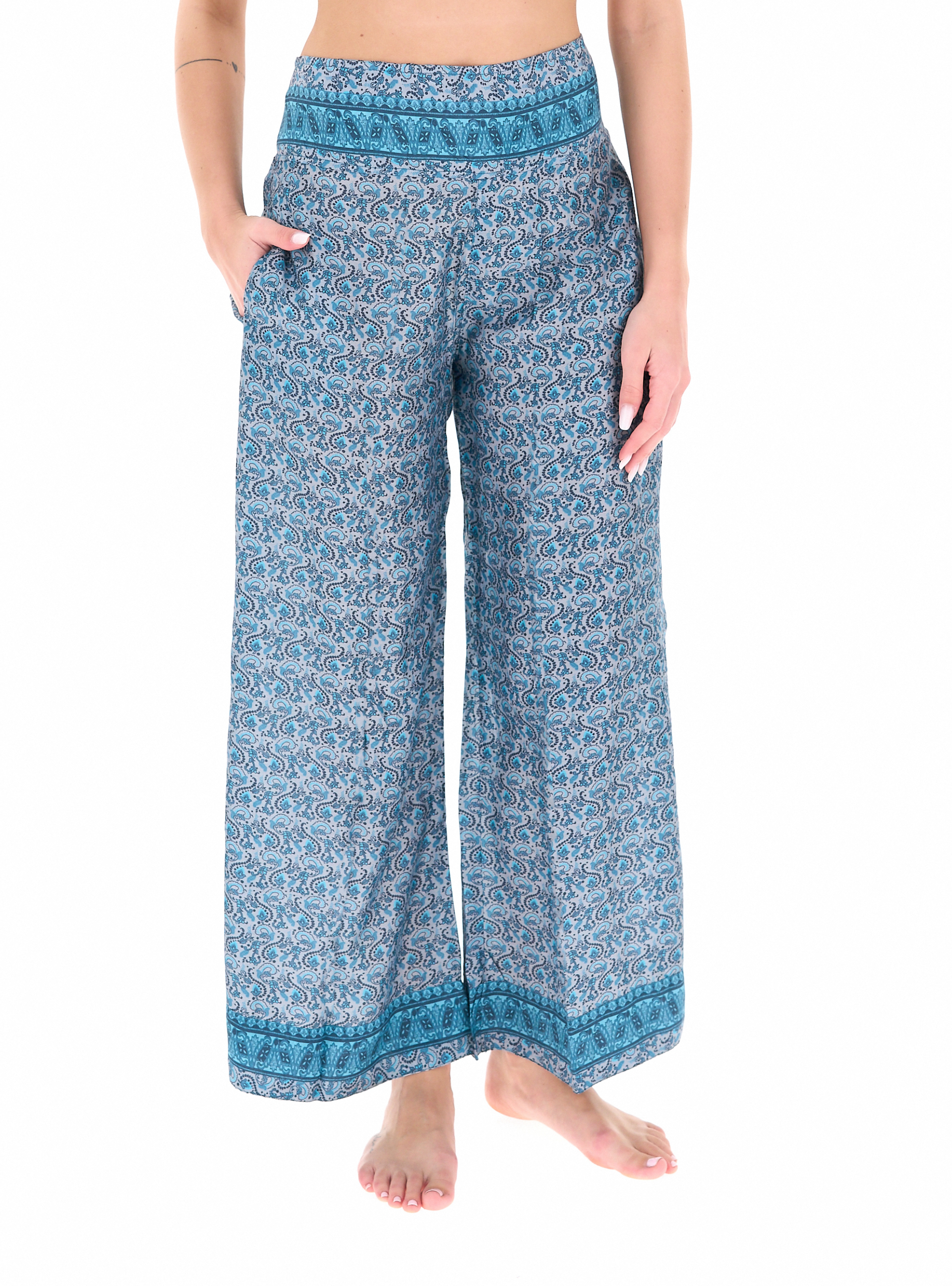 Pantalone copricostume TURCHESE