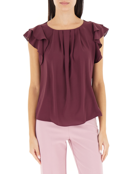 Blusa con volants