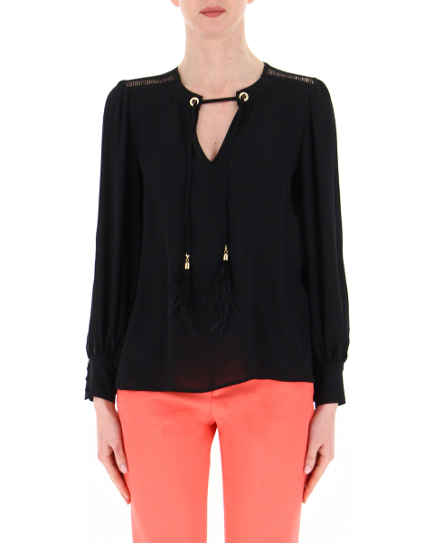 Blusa con piume