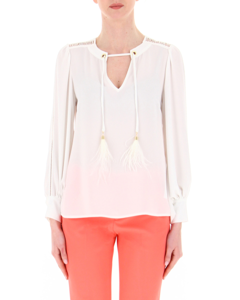 Blusa con piume