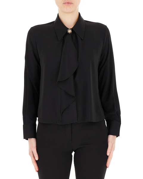 Blusa con volants