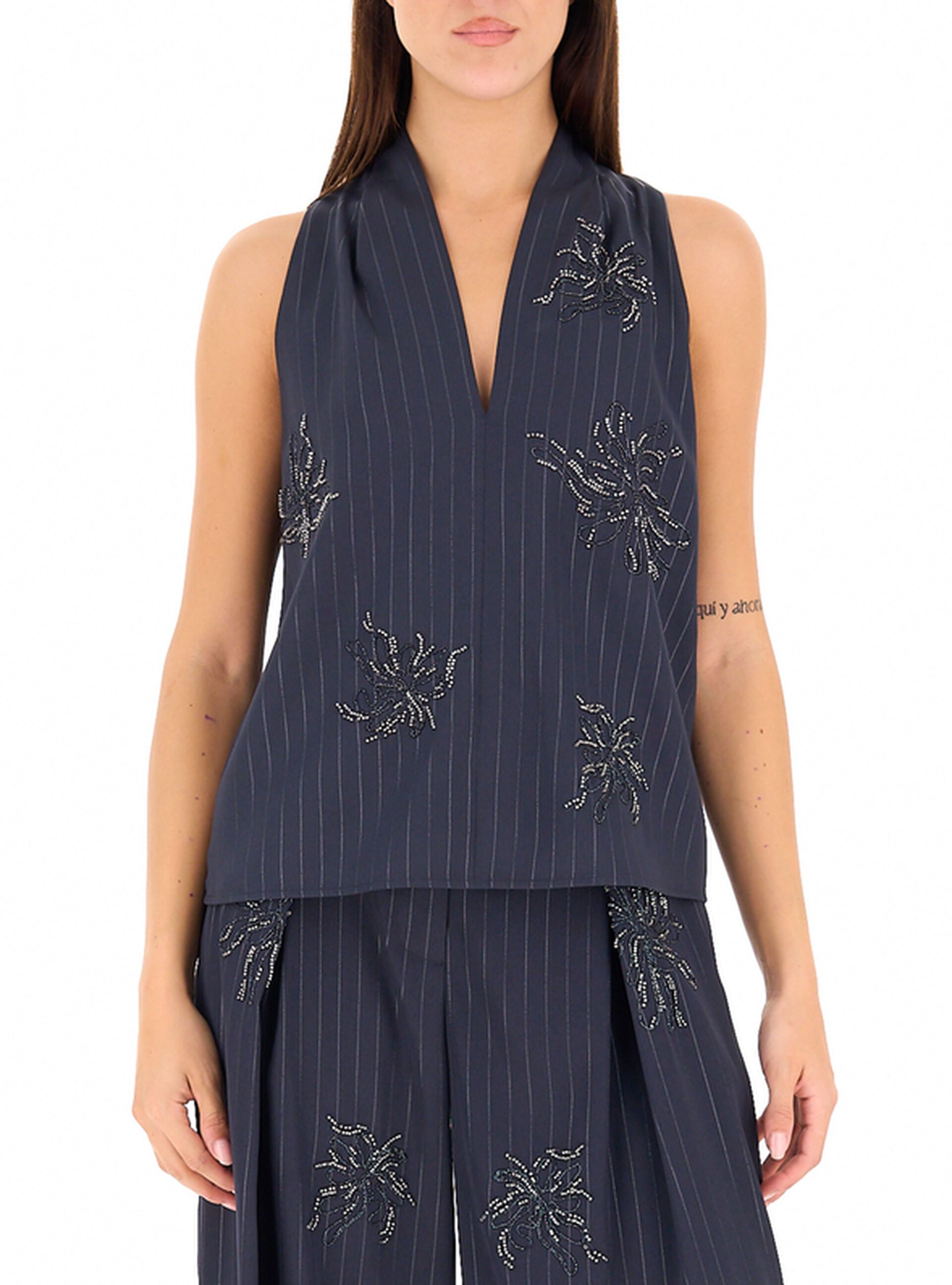 Blusa smanicata