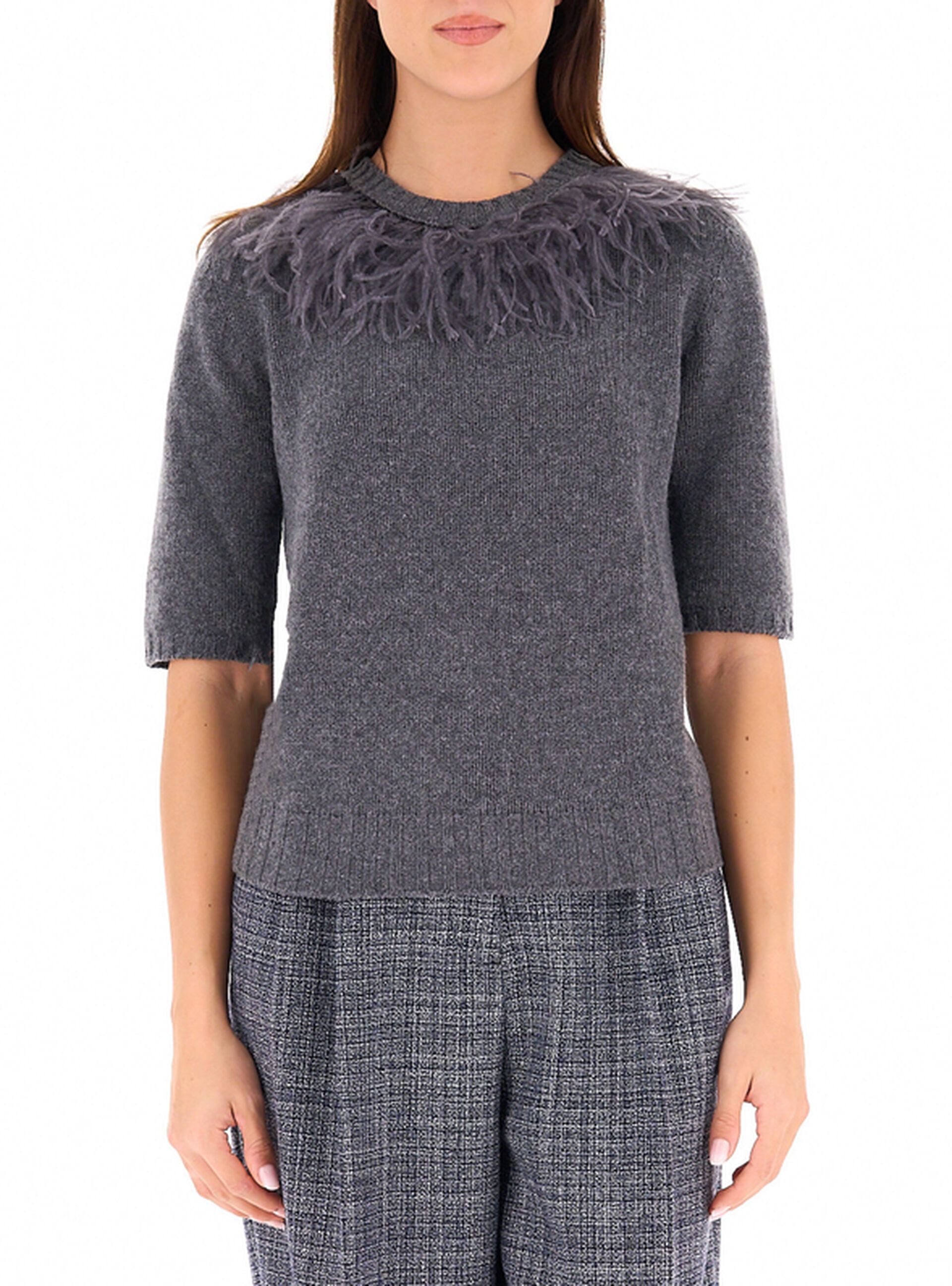 Maglione con piume