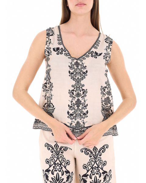 Blusa copricostume