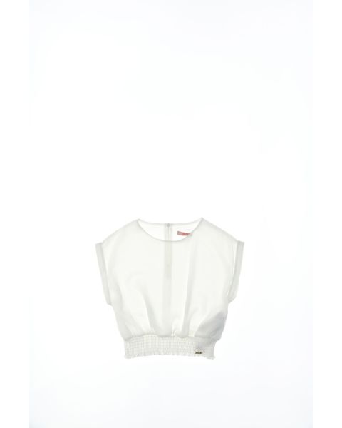 Blusa con spilla